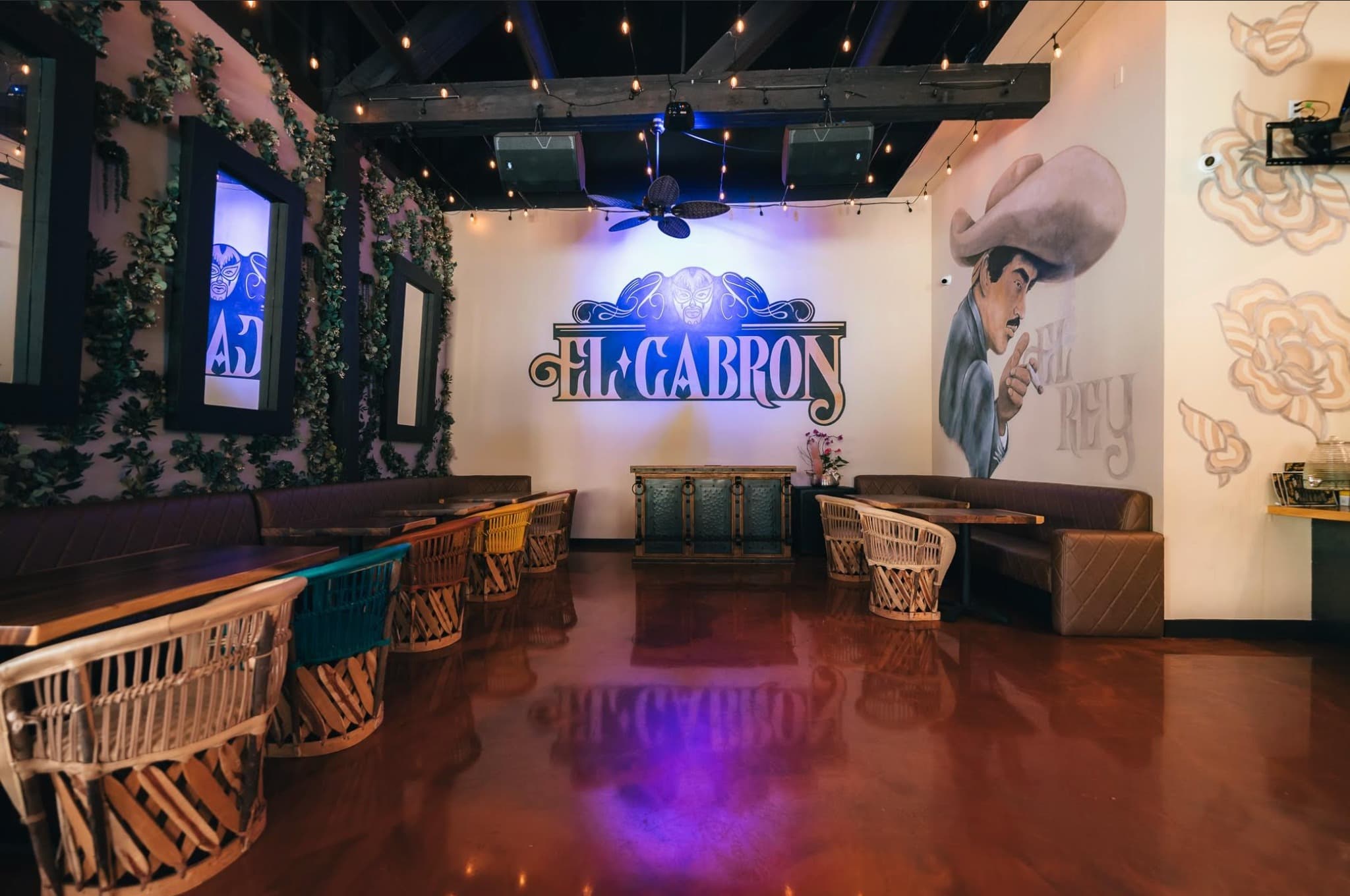 El Cabron Venue - Dining Area with Neon Sign